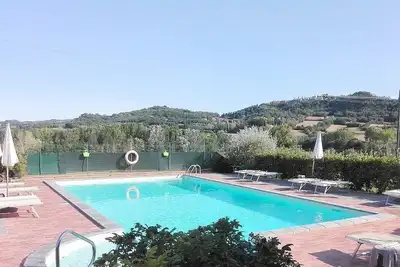 Image de Casa delle Mammole A: A characteristic and welcoming two-story apartment that is part of an ancient country house surrounded by the greenery, with Free Wi-Fi.