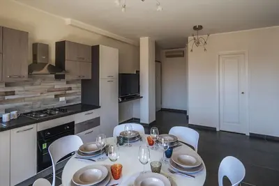 Image de Dei Mille 31 A - Trois Chambres Appartement, Couchages 8