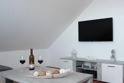 Image de Vacation apartment Grauschiefer - Weinstube Ferienwohnungen Johann Benzschawel