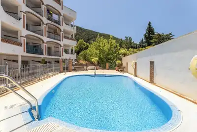 Image de Appartement Ático Alcaucín avec vue sur la montagne, piscine, W-Fi, jardin et terrasse