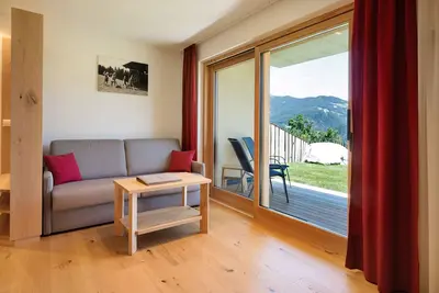 Image de Appartement de vacances \"Teutenhofer Kirsche\" Ă la ferme avec vue sur montagne et jardin