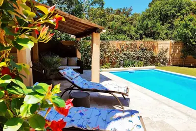 Image de Appartement climatisé 1ère etage max 7 pers. piscine privée plage à pied