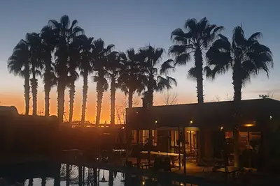 Image de A tranquil oasis of lush gardens and palm trees 15 mn drive from Marrakech