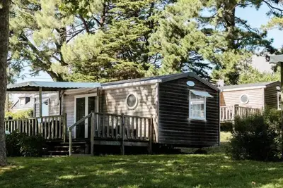 Image de Mobil-home Bois Confort 31m² (3 chambres) Quartier piéton + terrasse 18m² + Tv + Nespresso 6 personnes
