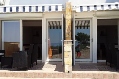 Image de Appartement Manuel d'une chambre avec terrasse et vue sur la mer