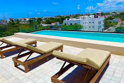 Image de 1 Bedroom apartment with views to green area and hamacs, Gym, Rooftop Pool