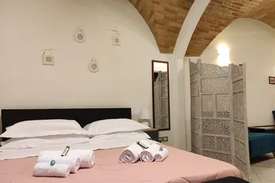 Image de Loft Gioia: Una Coccola Tra Tradizione E Modernita'