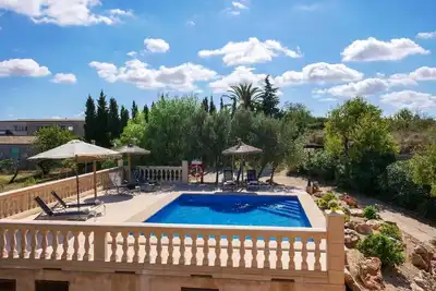Image de Maison de vacances Es Lladoner avec vue sur les montagnes, piscine, Wi-Fi et terrasse