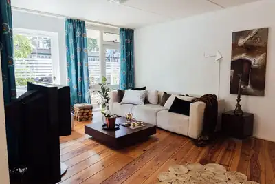Image de Appartement Ibiza in het Centrum met een Intieme Tuin en Terras op het Zuiden
