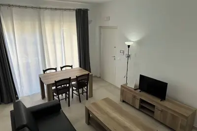 Image de Appartamento Nuovo 2021 a Passi dal Mare con Wi-fi/ethernet per Smart Working