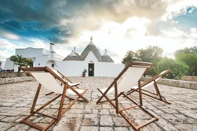 Image de Villa \"Trullo Paleo\" avec jardin et parking privé