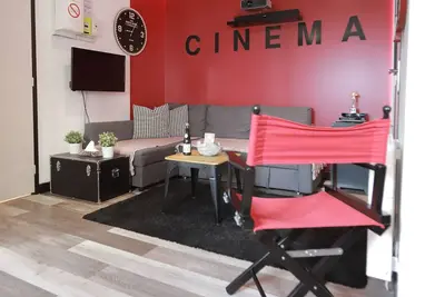 Image de Appartement Cinéma avec home cinéma et garage ferme