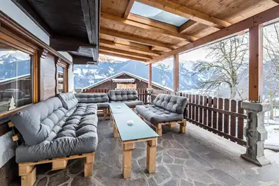 Image de Appartement spacieux dans le chalet alpin Bergprinzessin avec vue sur la montagne