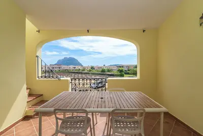 Image de Appartamento Il Borgo, solarium avec vue sur la mer