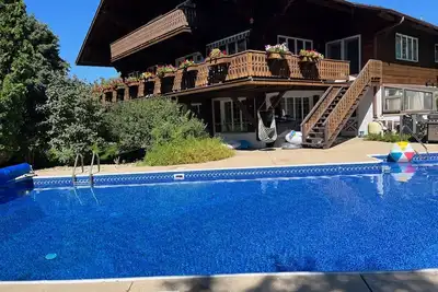 Image de Authentic Swiss Chalet w/ private saltwater pool, sauna, grill, fire pit & more