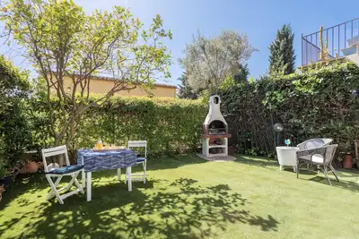Image de Bonita Casa Con Jardin Privado Y Piscina Comunitaria