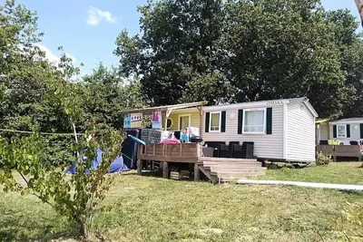 Image de Mobil-home Confort 30 m² (3 chambres) + Clim + terrasse semi-couverte 10m² 6 personnes