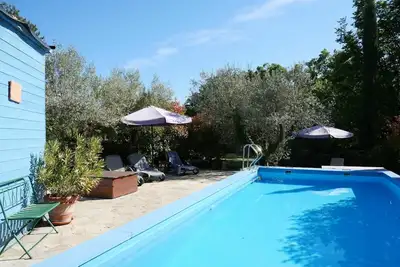 Image de Bel appartement dans une maison de vacances avec piscine, terrasse, animaux admis et parking