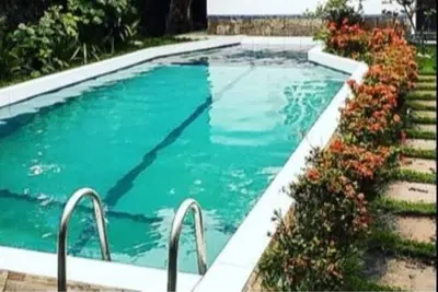 Image de Beautiful House Sossego Bahia with Wifi - beautiful garden, decorated with swimming pool