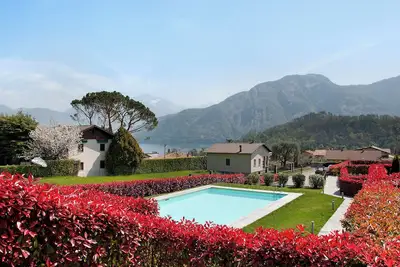 Image de Appartamento Zerboni C1 avec vue sur le lac et les montagnes, piscine, Wi-Fi, jardin et terrasse