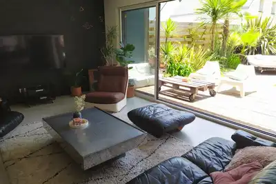 Image de maison bois plain pied proche littoral