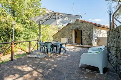 Image de Maison de vacances \"Il Colletto Romantic Stonehouse\" avec vue sur la montagne, jardin et terrasse