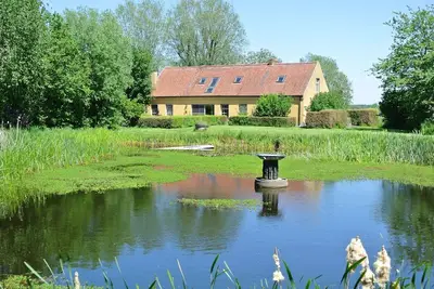 Image de Maison de vacances Het Zuidgoed avec jardin
