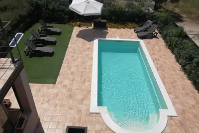 Image de Appartamento Indipendente in Villa con Piscina e Accesso Privato Alla Spiaggia