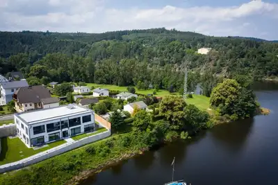 Apartments -Saaldorf Wg 5 with balcony and view of the reservoir