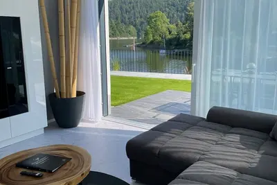 Apartments -Saaldorf Wg 2, terrace and view of the reservoir