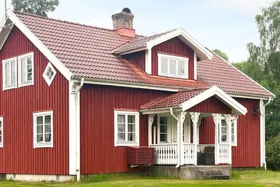 Image de Maison de vacances pour 8 a Virestad-By Traum