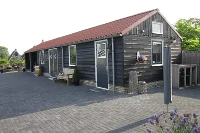 Image de Beautiful b&b/ vacation home located on a large garden surrounded by water.