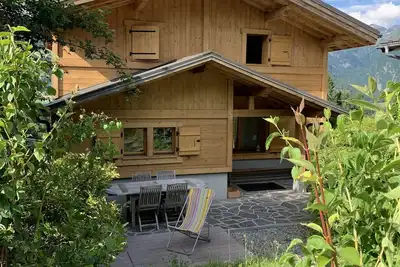Image de Chalet familial design spa nordique et vue montagnes