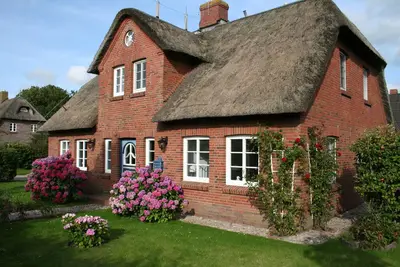 Image de Ferienhaus für 10 Gäste mit 150m² in Borgsum