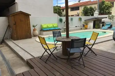 Image de appartement Rez de jardin piscine chauffée, barbecue, plancha