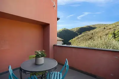 Image de Appartement Immerso nel Verde avec vue sur les montagnes, terrasse et Wi-Fi. Animaux admis