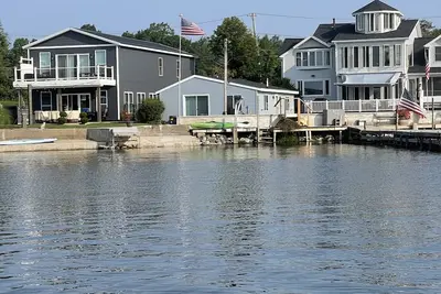 Sunrise Bay 2 - Trendy lakefront home w/sunrise view, boat dock & walk to beach