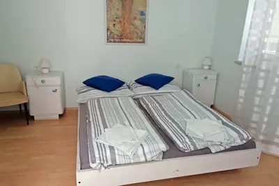 Image de Appartement 1 fĂĽr Drei Personen mit Blick auf den Garten