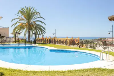 Image de Appartement avec vue sur mer et montagnes, piscine, climatisation, Wi-Fi, jardin et terrasse