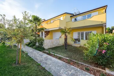 Image de Manfroi house with apartments / Arancia apartment