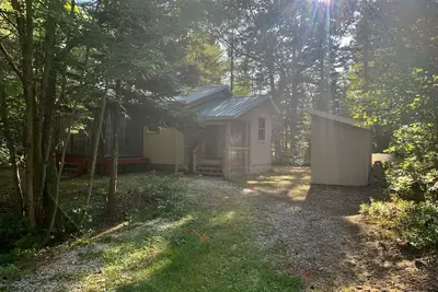 Image de Superior Home - A Cabin in the Woods with Screened In Porch & Beach Access 🏖