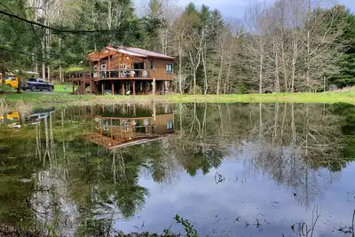 Image de Solar Cabin: A Modern, Off-grid Retreat on 100 Acres