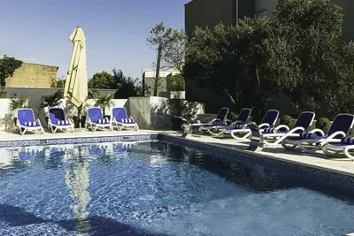 Image de Villa Royal - appartement premium avec piscine ensoleillée