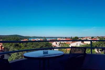 Image de Appartement de vacances près de la plage avec vue sur la mer