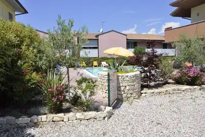 Image de Appartement de vacances avec balcon et piscine