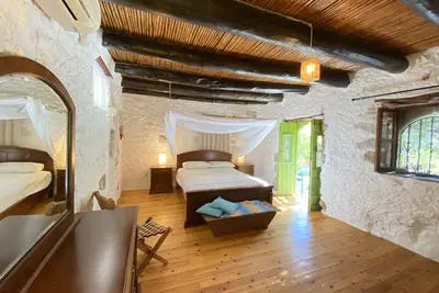 Image de \"Lithospito\" 300 years old Natura cottages spacious private garden by the river