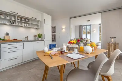 Image de Fantastic vacation apartment with sauna and fireplace built in 2019 in the Baltic Sea spa resort of Prer