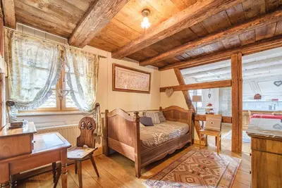 Image de Gîte au 2ème étage d'une maison alsacienne avec parking et jardin