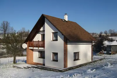 Image de Maison de vacances avec cheminée et foyer extérieur