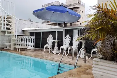 Penthouse with pool 5 min walk from the beach (400 m/4 blocks) maximum 12 people